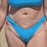 Malene’s Beach Bikini Tease: Camel Toe Reveal