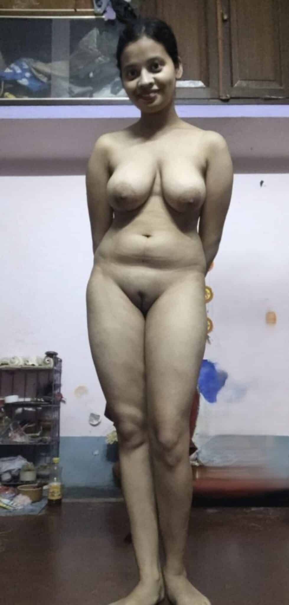 ashawo with pant only in picture - Curvy MILF Flashes Her Natural Assets A curvy MILF confidently flashes her natural assets in a bedroom setting, showcasing her full figure and inviting gaze. - Bitch Flashing Pics