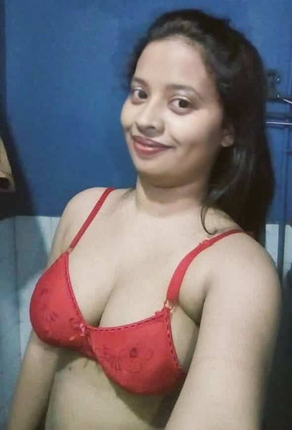 boob pics - MILF’s Playful Tease: Red Lace Reveal A South Asian MILF in a red lace bra poses confidently, her gaze commanding and playful. Cleavage visible, she teases with what's not shown. - Bitch Flashing Pics