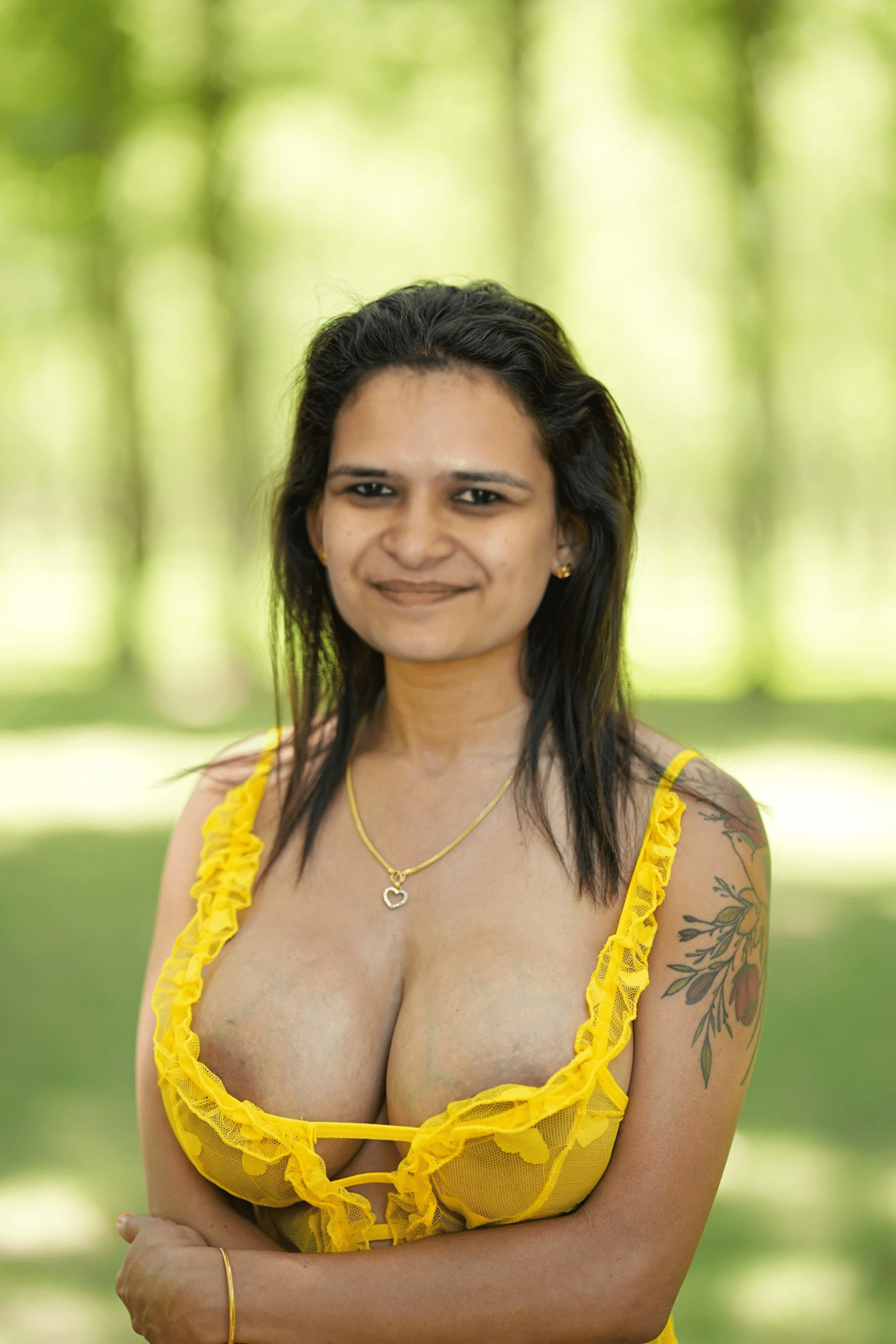 Bitch Flashing Pics: South Asian MILF Flashes Big Boobs in Public South Asian MILF flashes big boobs outdoors, wearing a yellow lace bra pushed down, revealing natural, erect nipples. Confident pose with gold jewelry and fl...