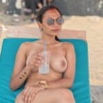 Beach Babe: Nude Sunbathing in Public