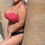 MILF Flashes Her Massive Melons on the Beach