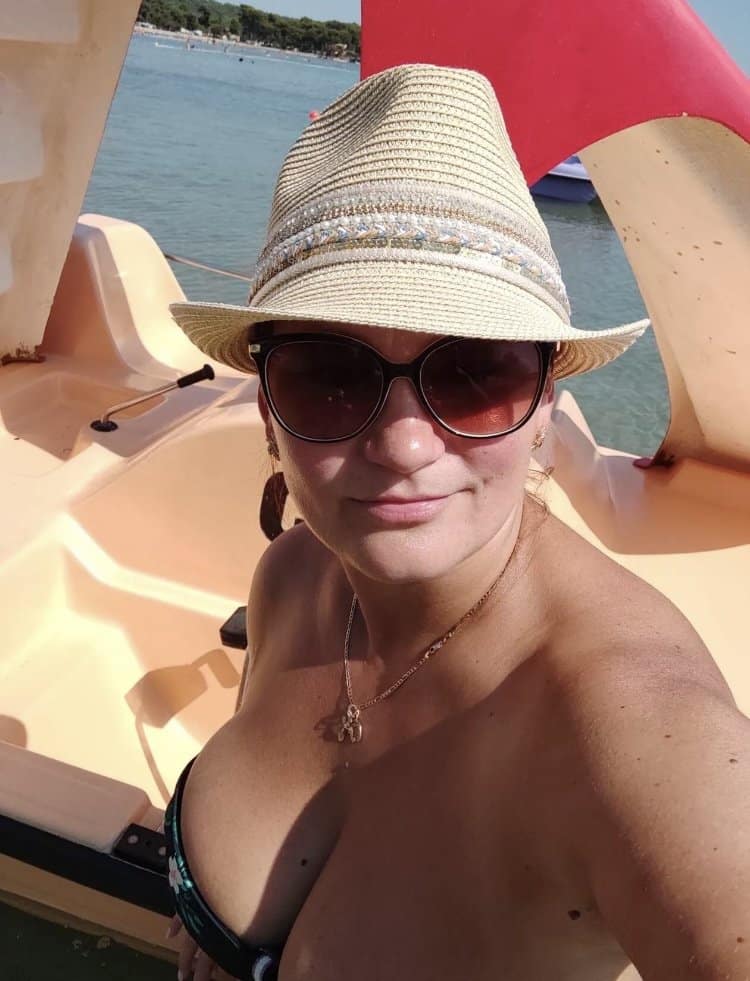 african lady woman big vagina pissing photo - MILF’s Cleavage Tease on the Water A MILF in a bikini top sits on a paddle boat, her big boobs pushed up, creating visible cleavage. She wears a straw fedora and sunglasses, adding to her allu... - Bitch Flashing Pics