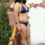Miss Noopur Dash nick name MAJJA Standing in a park in Blue color Bikini infront of Artificial Snow fall pic clicked by MAJJA’s Own Brother Bijay Dash During Summer vacation