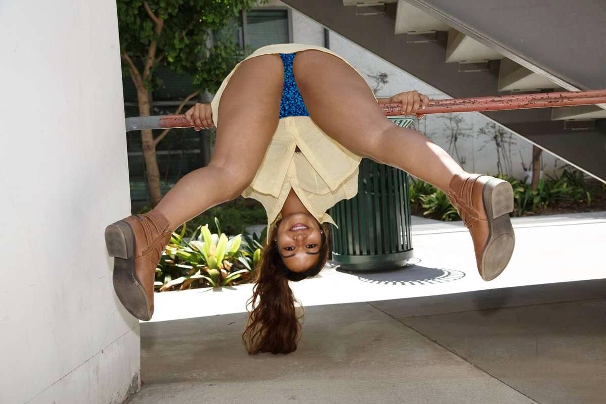 Ass Flash Pics: Office Entrance: Mature Ass Flash A mature woman's ass is playfully flashed at the office entrance, captured in a candid, upside-down shot by her colleague.