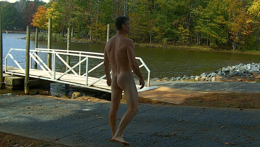 pics afrcan boys big cock sex xxx - Public Park Nudity: A Candid Moment A man stands nude on a public dock, his back to the camera, a candid moment of public nudity captured. - Public Flashing Pics