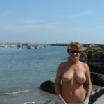 UK Wife Flashes Her Boobs on Rocky Shoreline